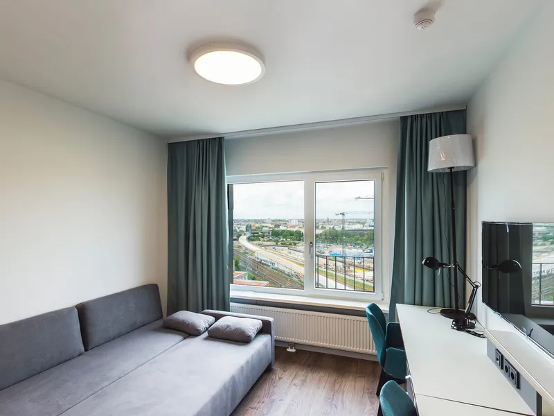 Mietrabatt - Mitte Möblierte Neubau Studio mit Fitness Studio und Concierge — photo 1